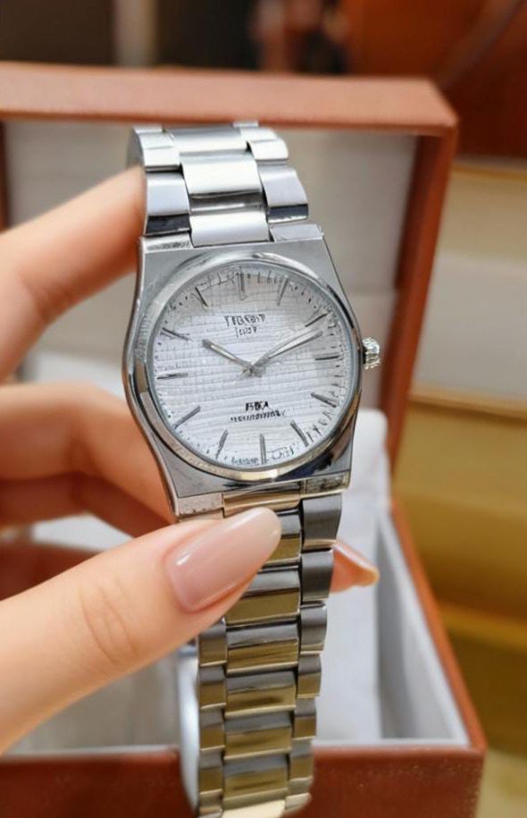TISSOT PRX GENTS WATCH⌚