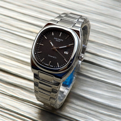 PATEK  PHILIPPE GENEVE STAINLESS STEEL DATE WORKING WATCH